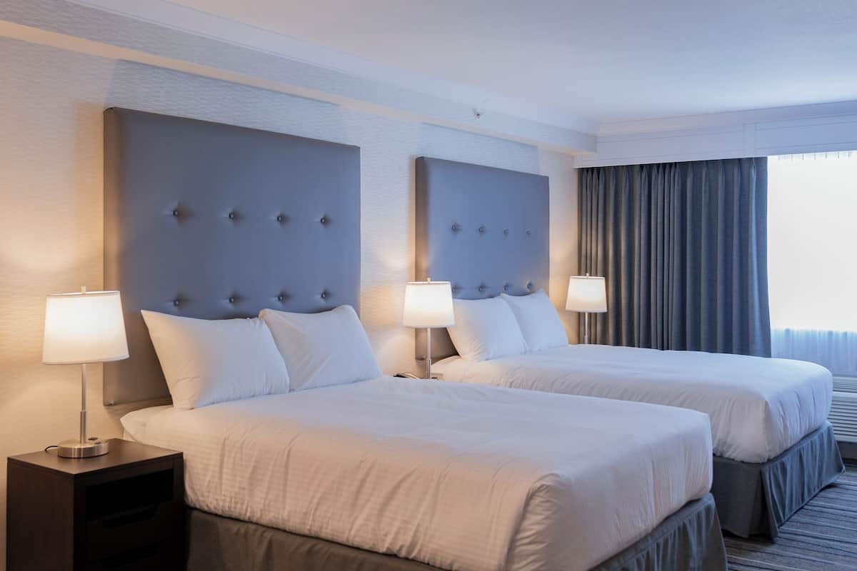 Premium bedding, blackout curtains, iron/ironing board, free WiFi