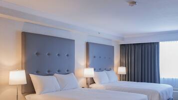 Premium bedding, blackout curtains, iron/ironing board, free WiFi