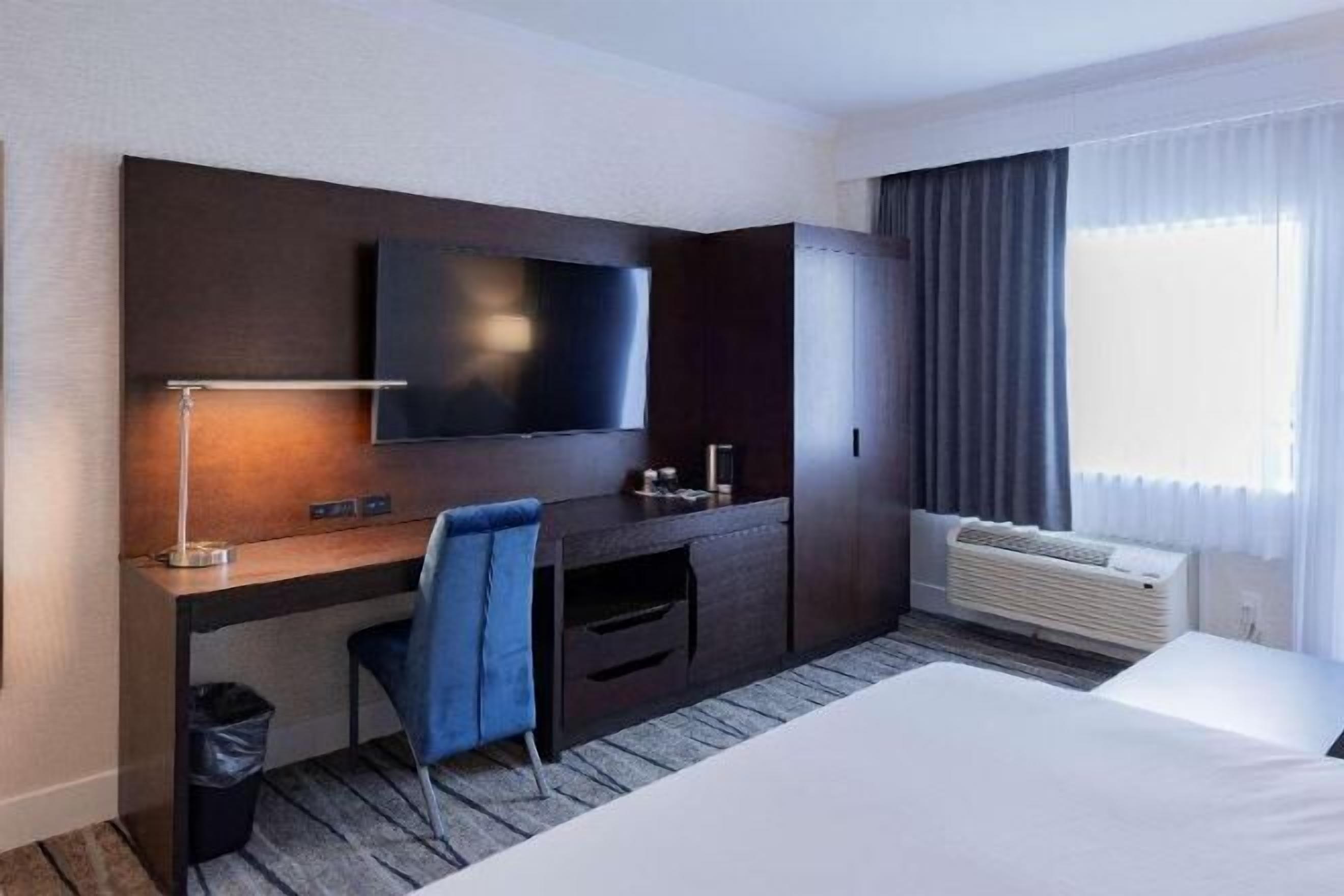 Premium bedding, blackout drapes, iron/ironing board, free WiFi