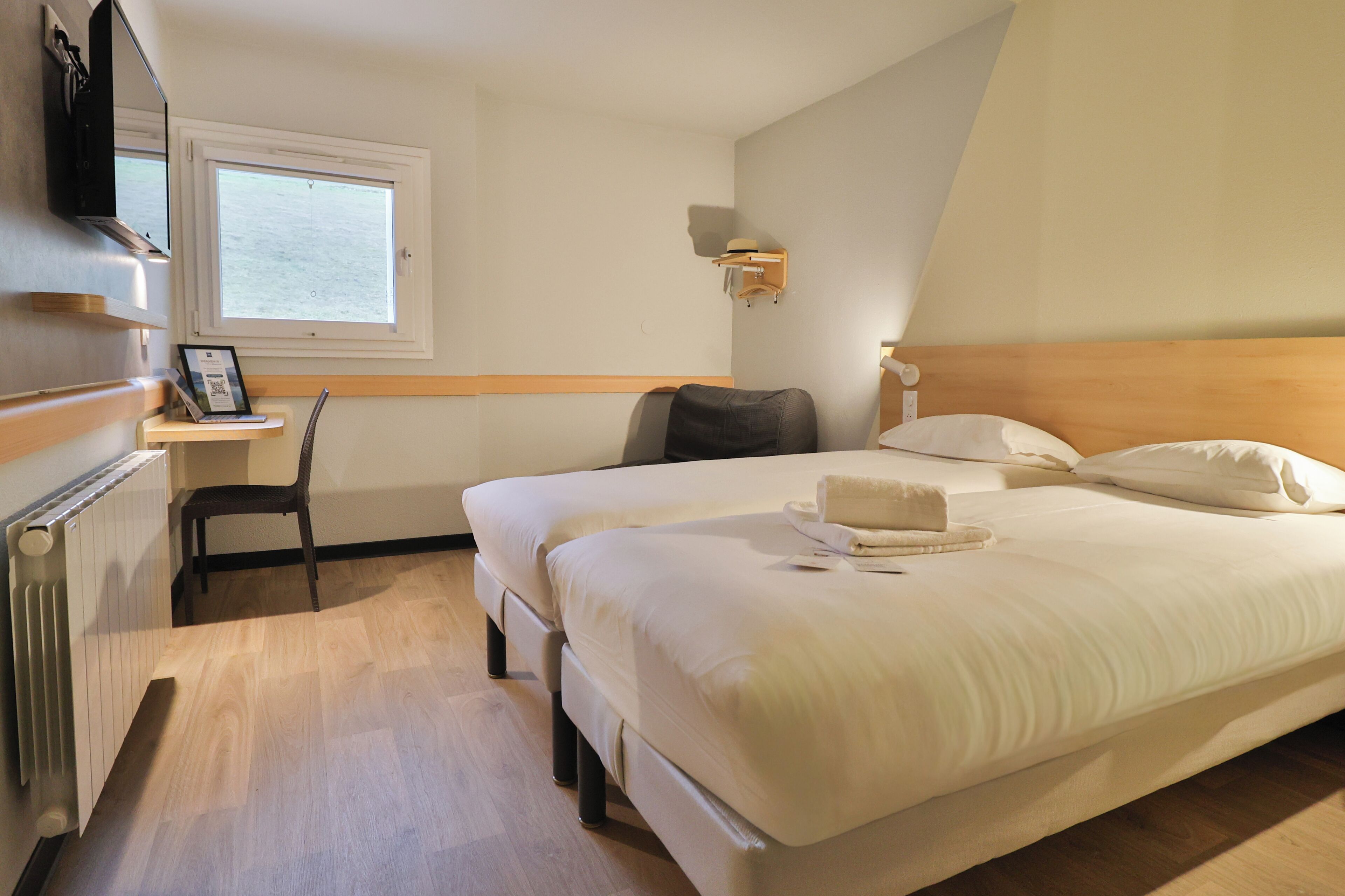 Room | Premium bedding, desk, blackout curtains, soundproofing