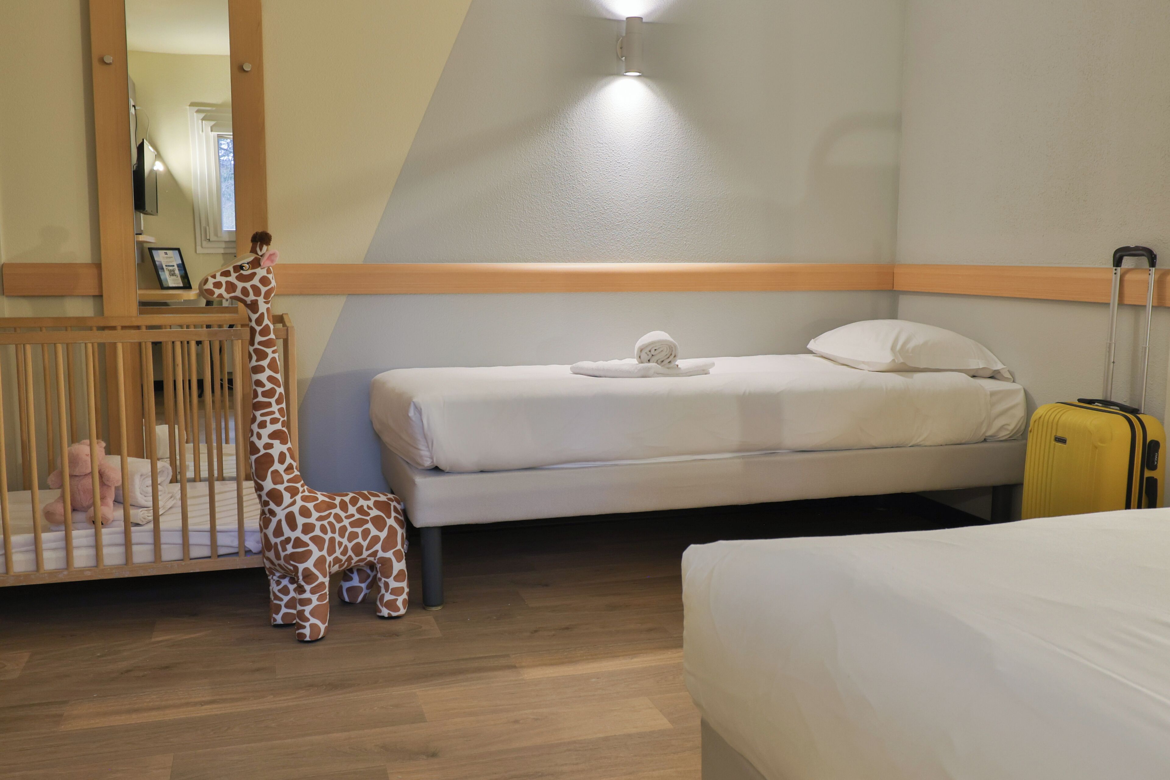 Family Room | Premium bedding, desk, blackout drapes, soundproofing