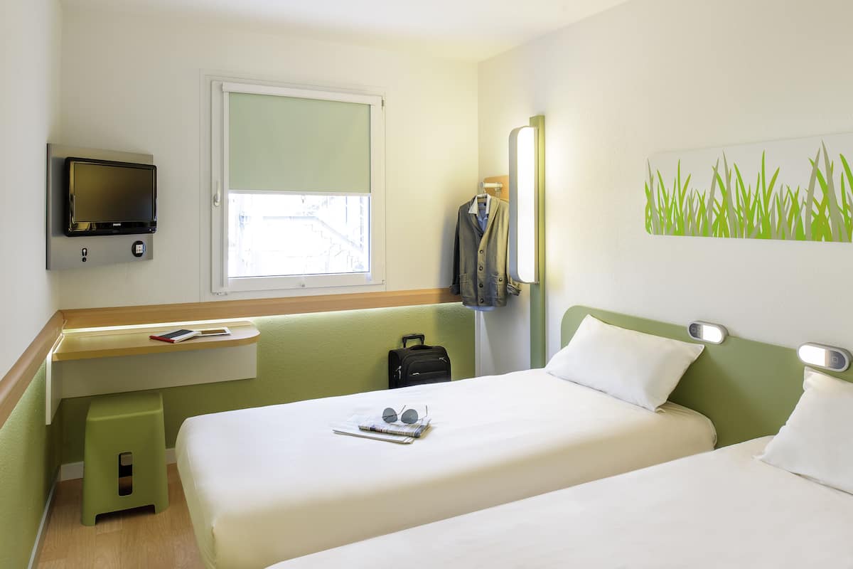Premium bedding, desk, blackout curtains, soundproofing