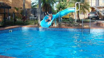 Outdoor pool, open 8:00 AM to 7:30 PM, pool loungers