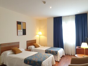 Family Room | 1 bedroom, down comforters, blackout drapes, free WiFi