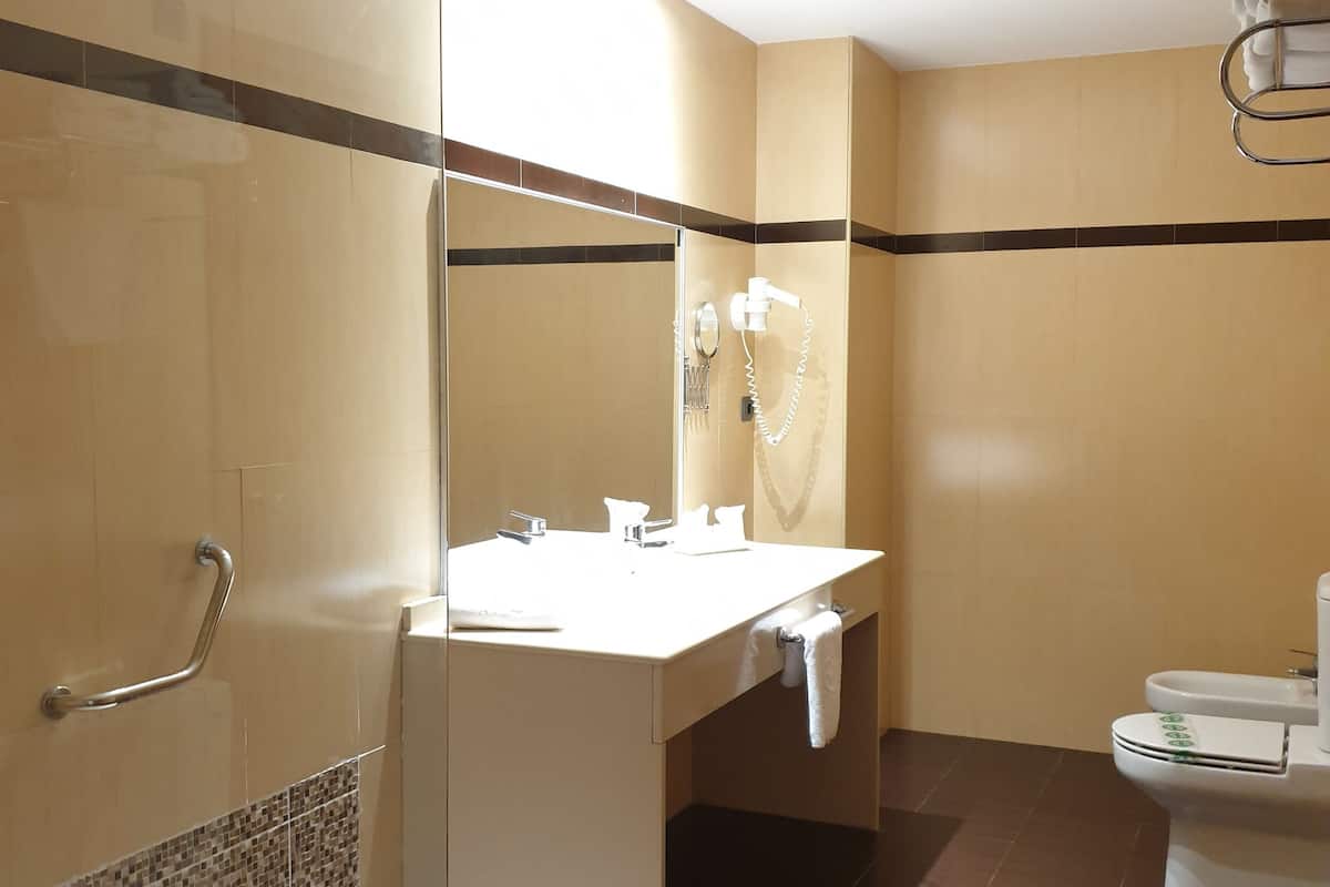 family room | bathroom | hair dryer, soap, shampoo, toilet paper