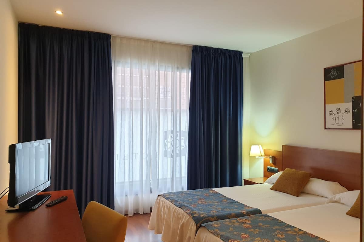 family room | down duvets, blackout curtains, free wifi