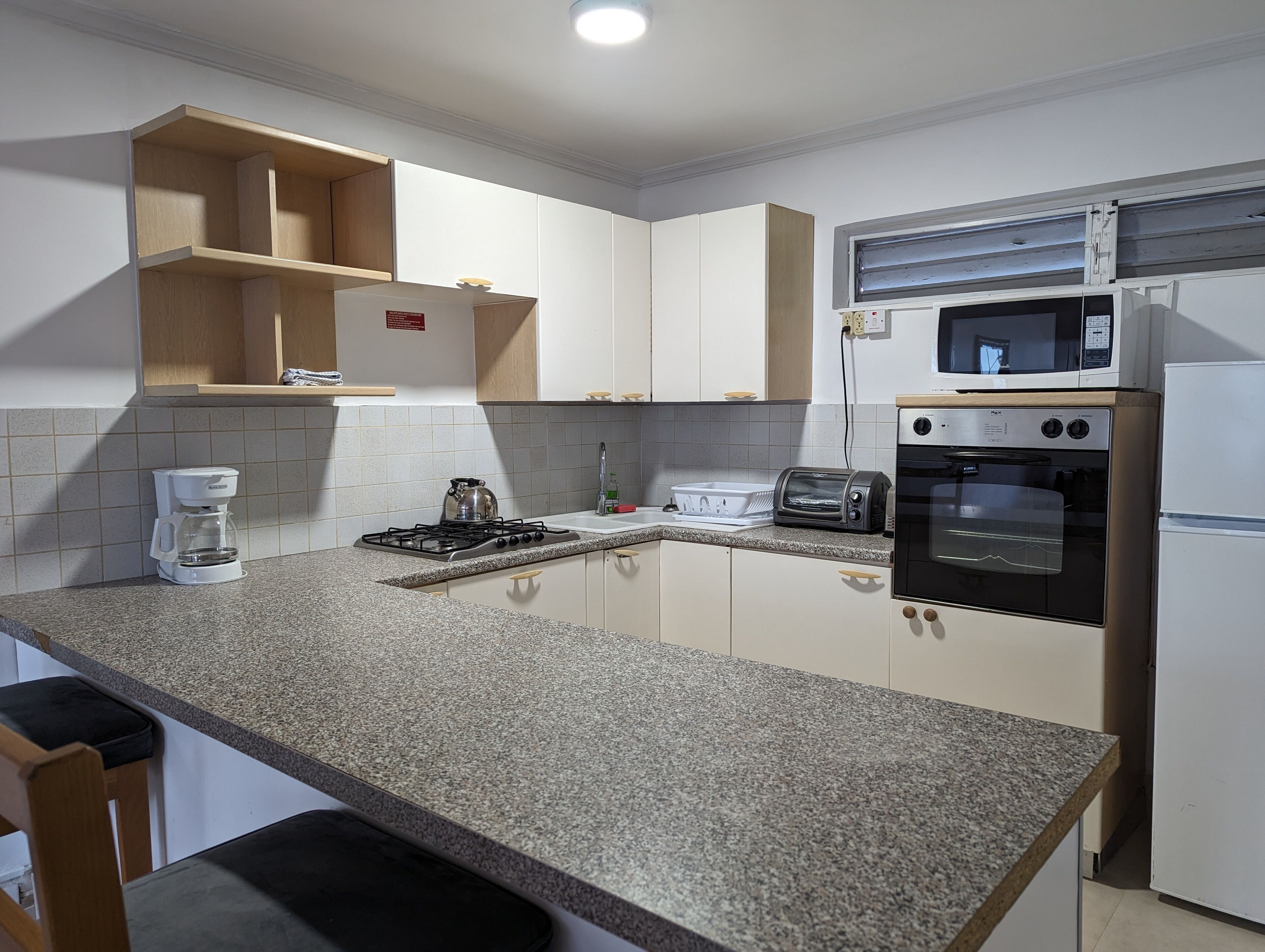 superior apartment | private kitchenette | fridge, microwave, stovetop, toaster