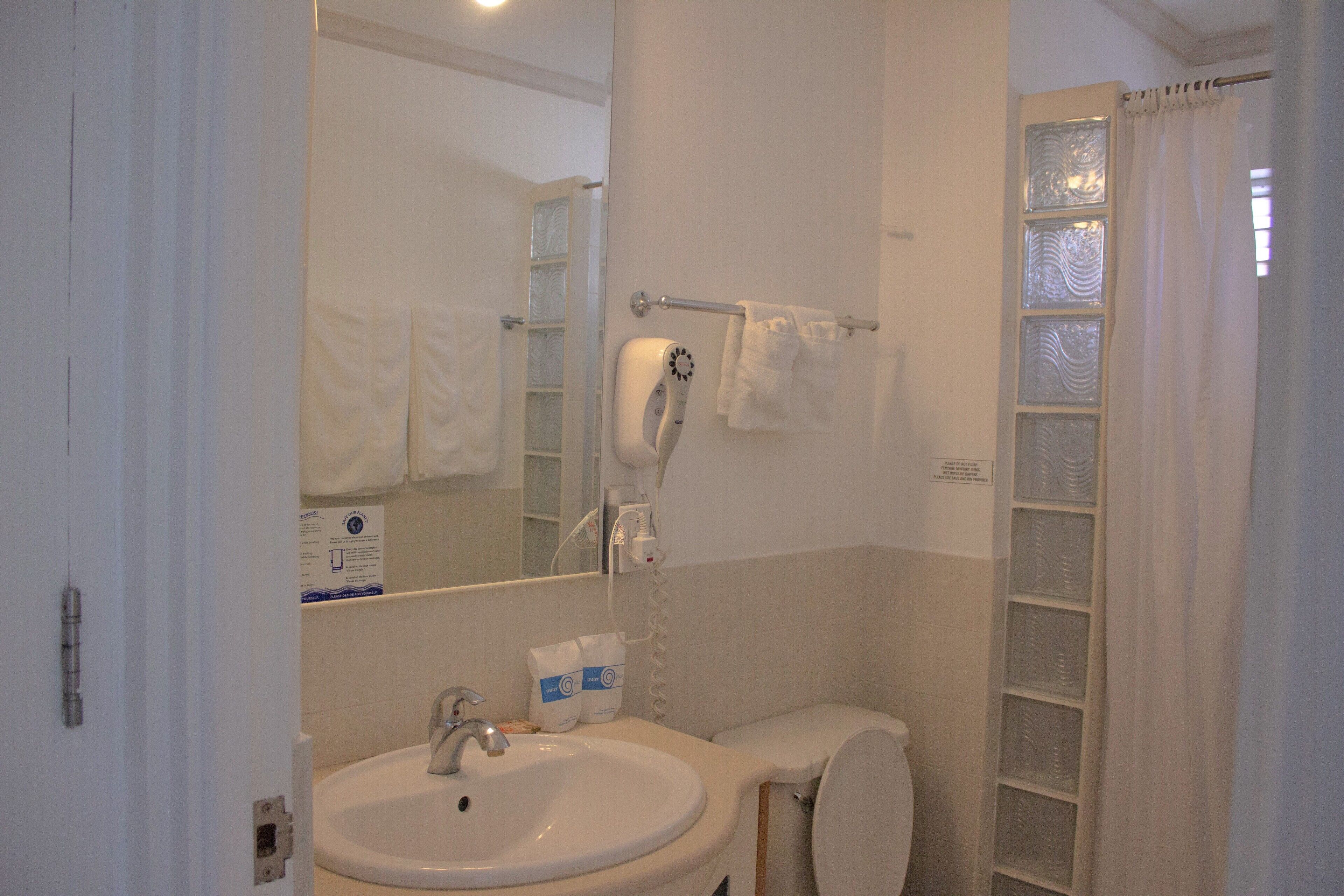 superior apartment | bathroom | shower, hair dryer, towels
