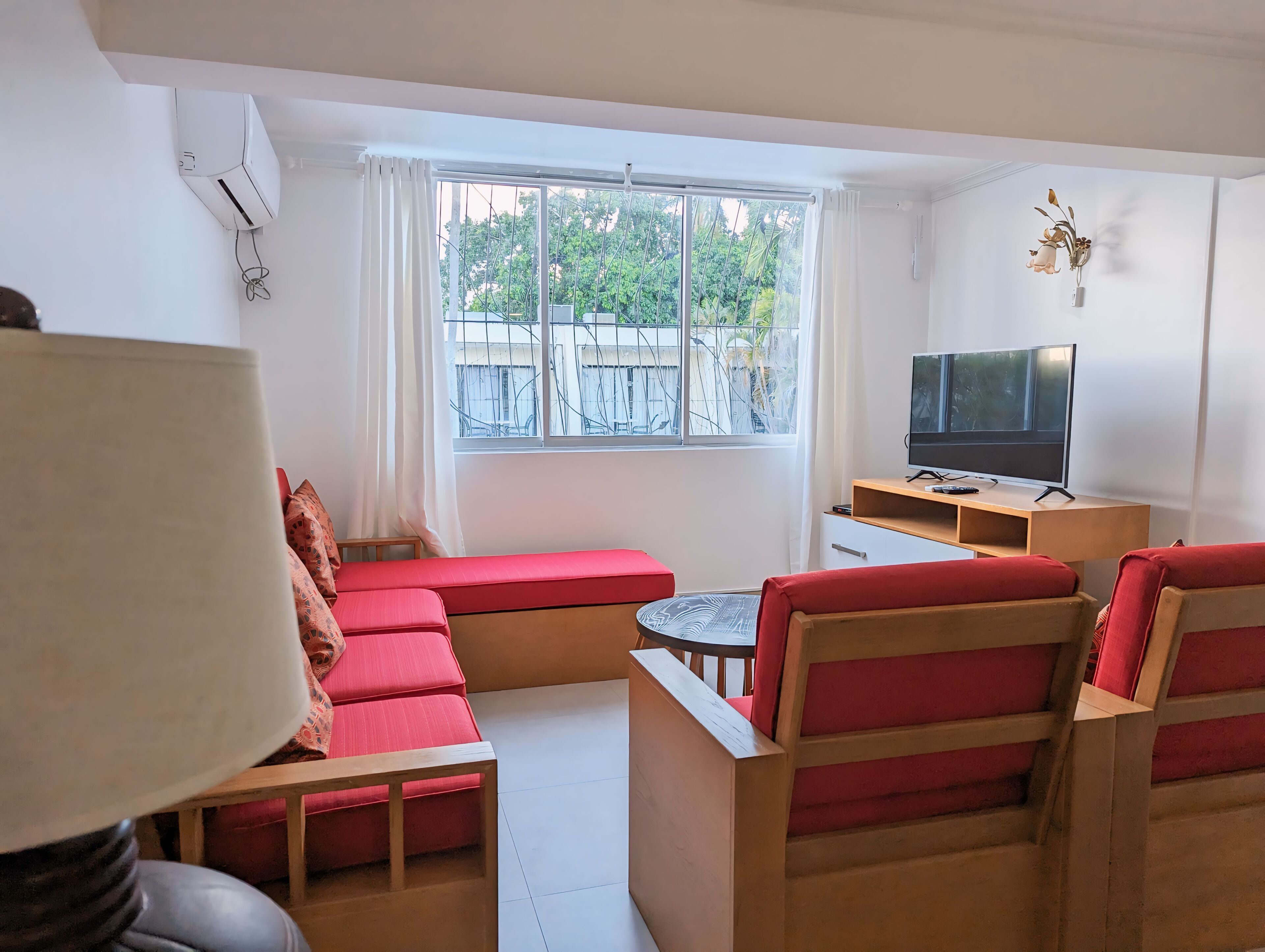 superior apartment | living area | flat-screen tv