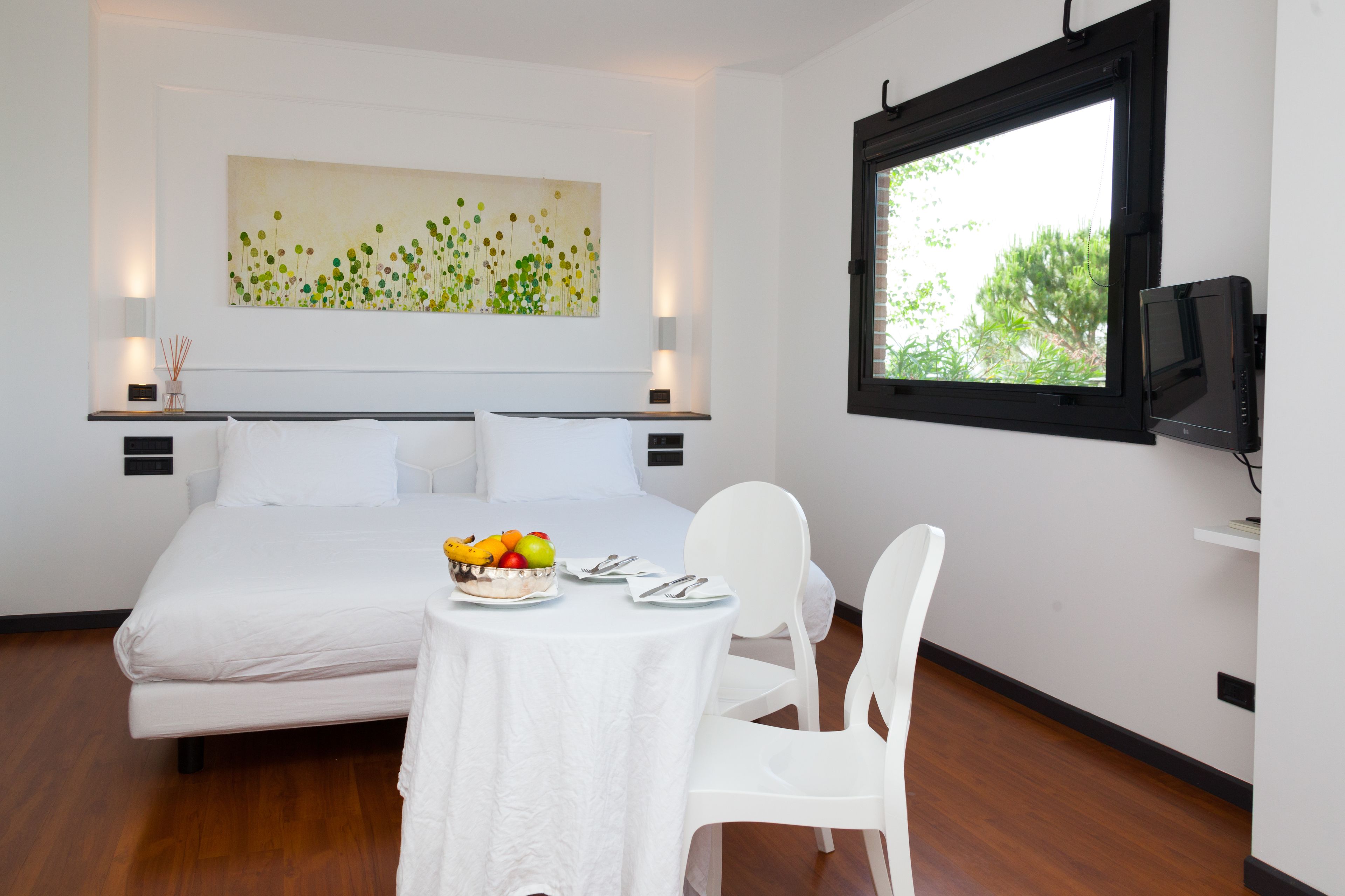 junior triple room, 2 bathrooms, hill view | premium bedding, minibar, in-room safe, desk