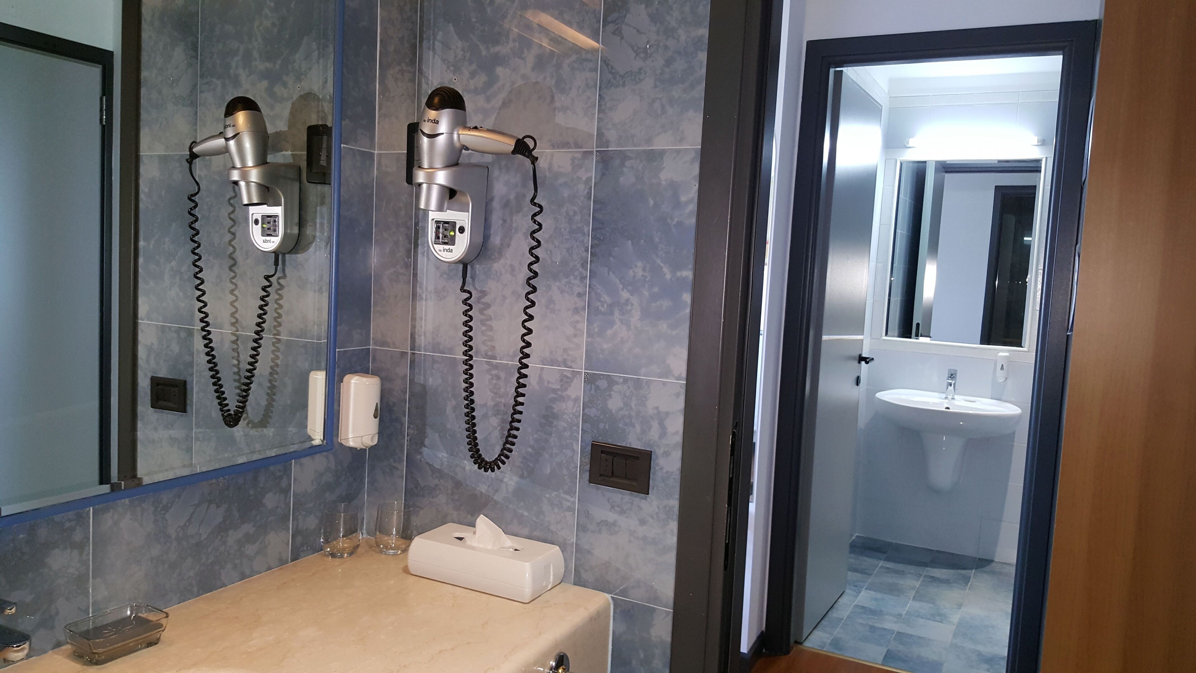 junior triple room, 2 bathrooms, hill view | bathroom | combined shower/bathtub, deep-soaking bathtub, hair dryer, slippers