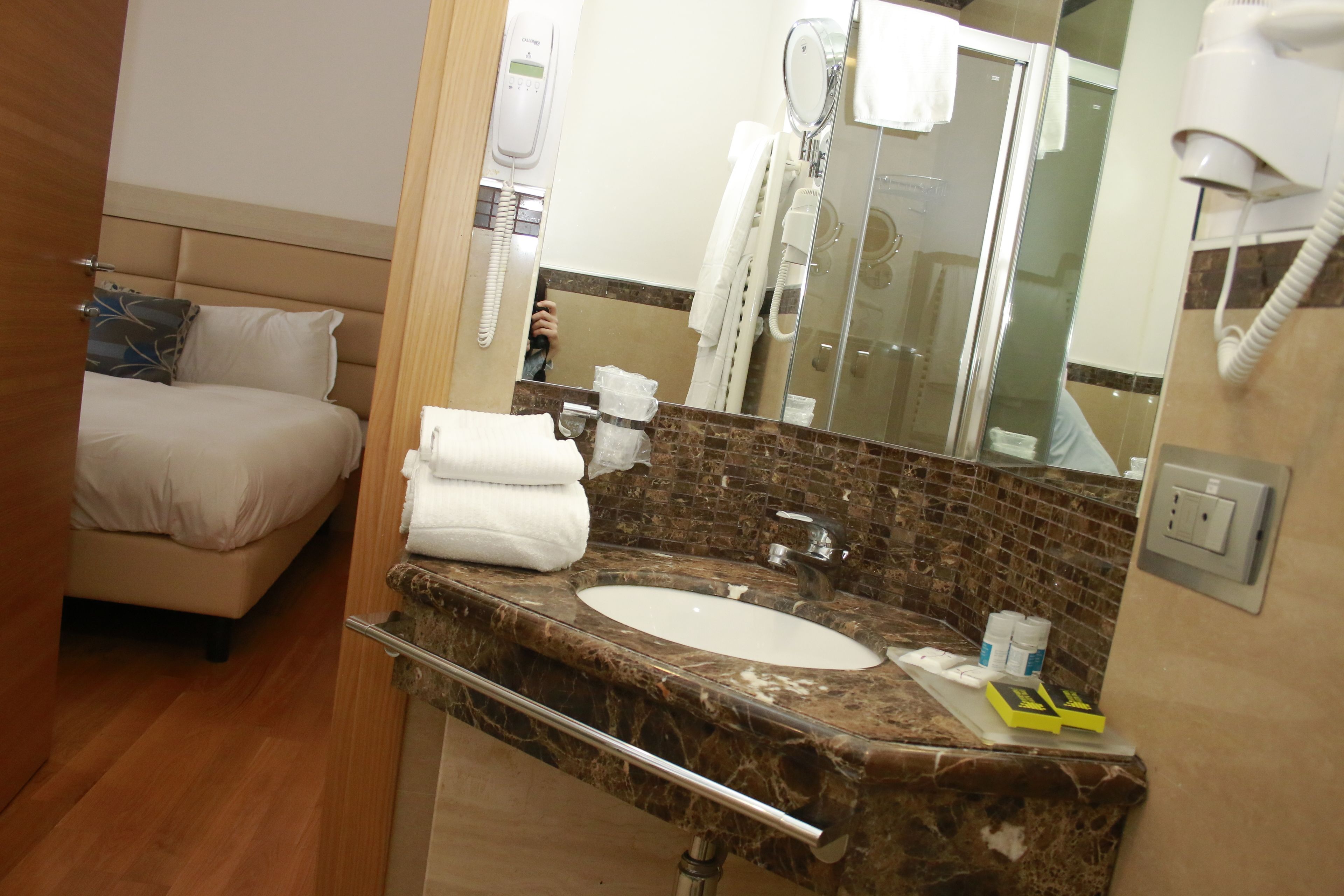 standard double room single use, 1 bedroom, non smoking, city view | bathroom | combined shower/bathtub, rainfall showerhead, free toiletries