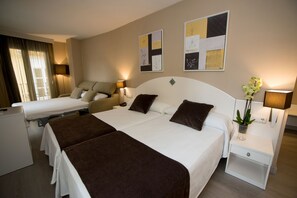 Ropa de cama de alta calidad y minibar 