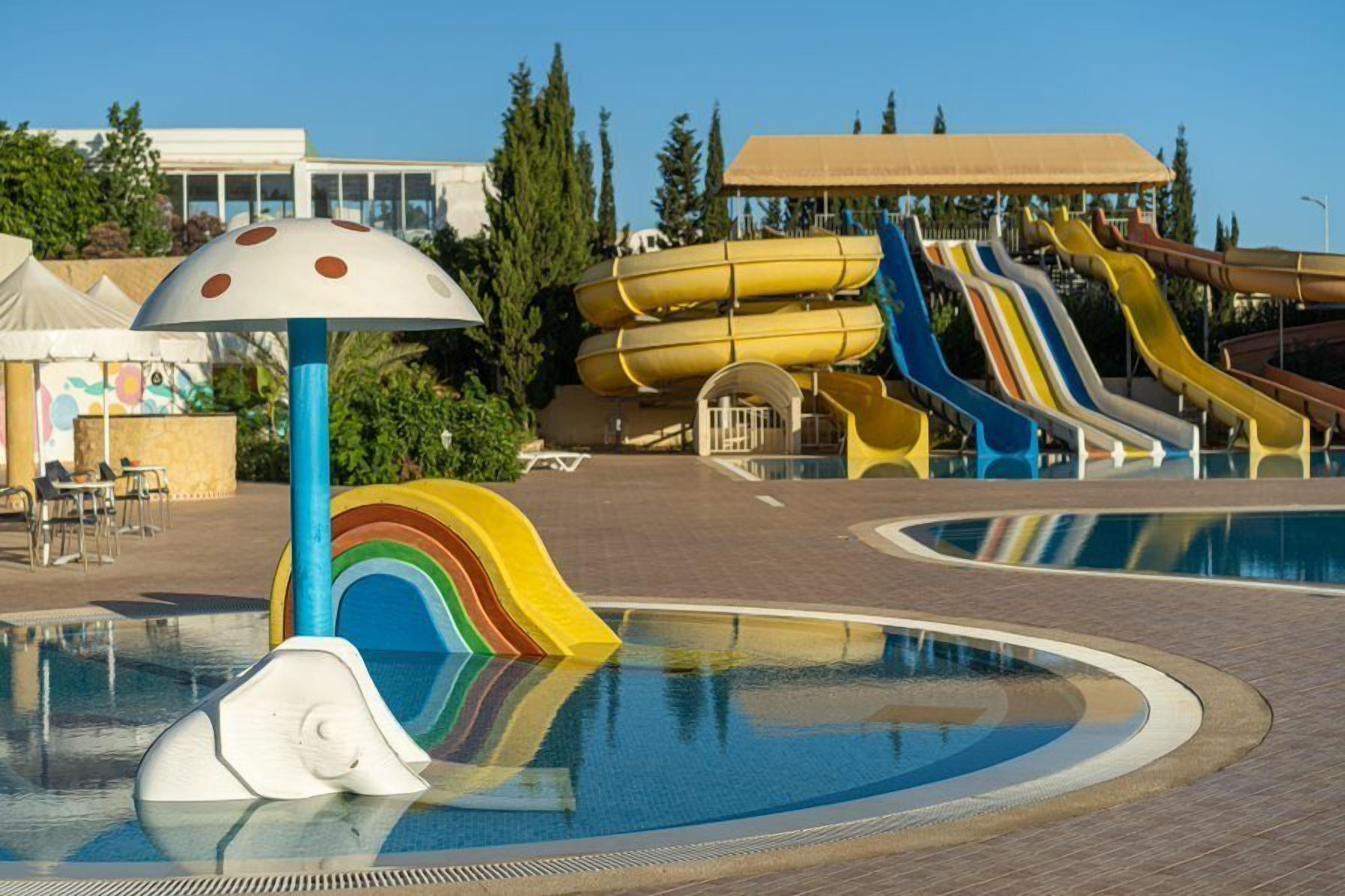 A water park with slides and a pool.