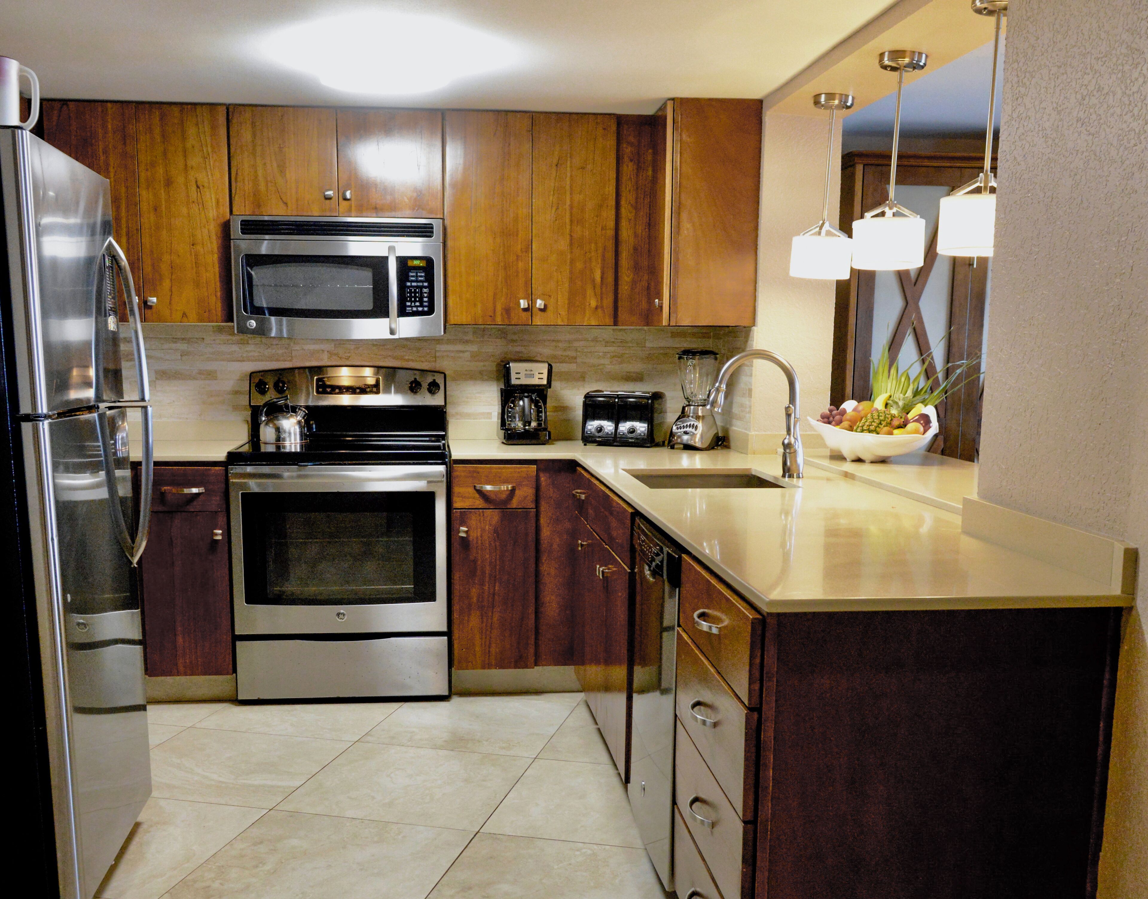 deluxe suite, 1 bedroom, kitchenette, oceanfront | private kitchen | full-sized fridge, microwave, oven, stovetop