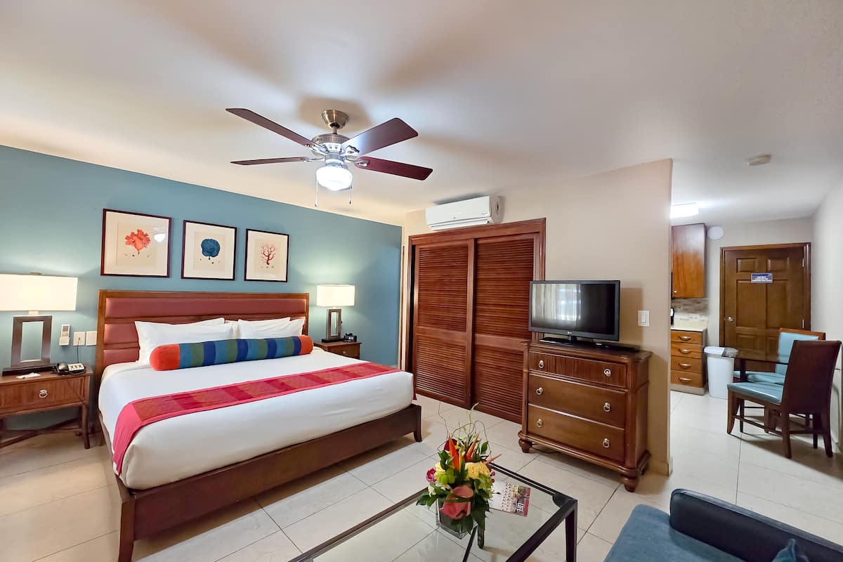 deluxe studio with fully equipped kitchen | premium bedding, memory-foam beds, in-room safe, blackout curtains