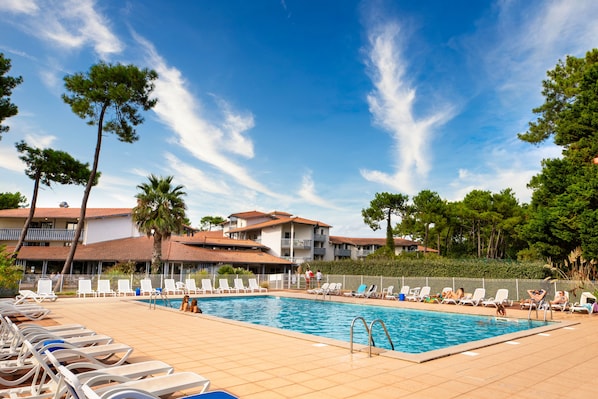 Outdoor pool, pool umbrellas, pool loungers