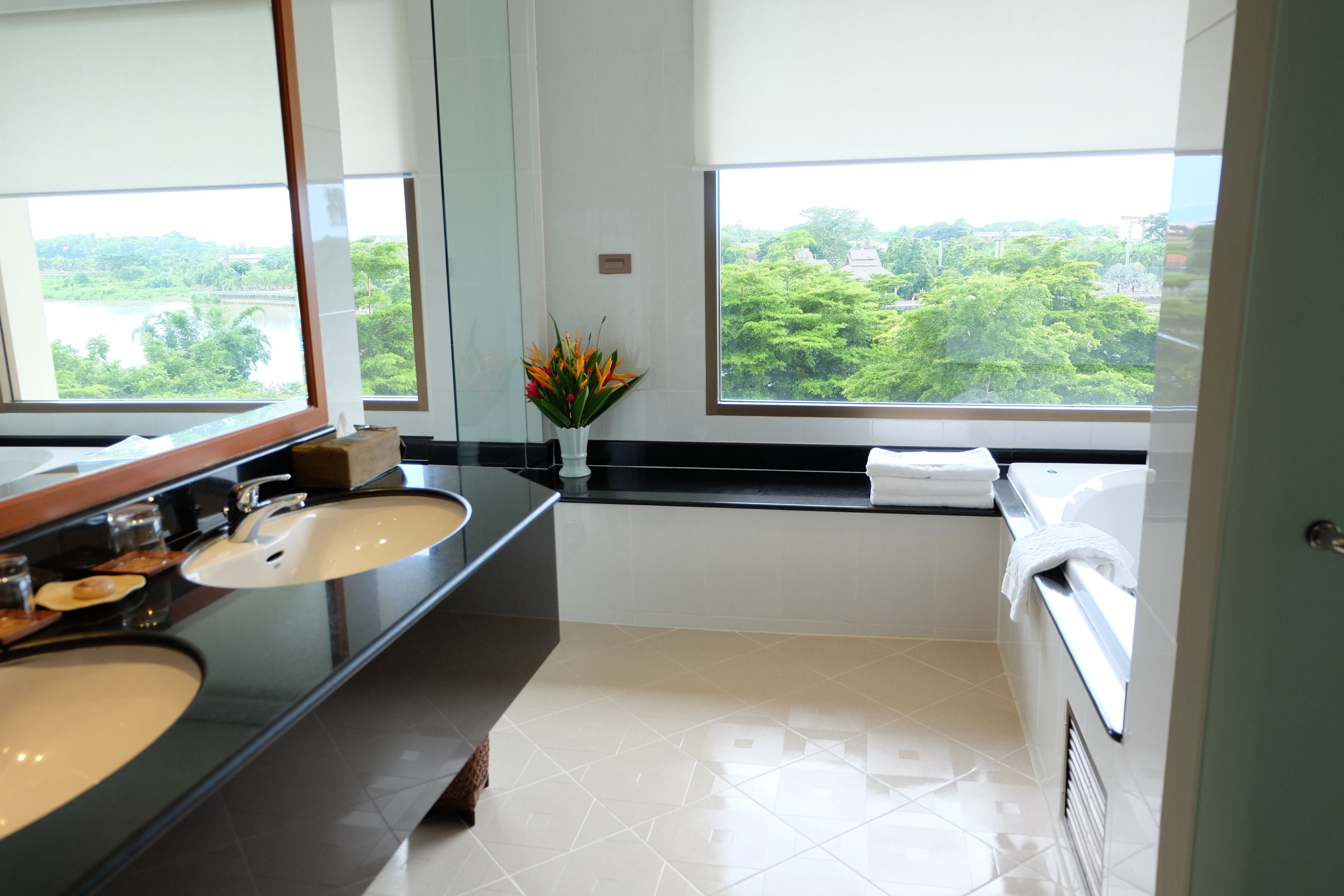 suite, balcony, river view | bathroom sink