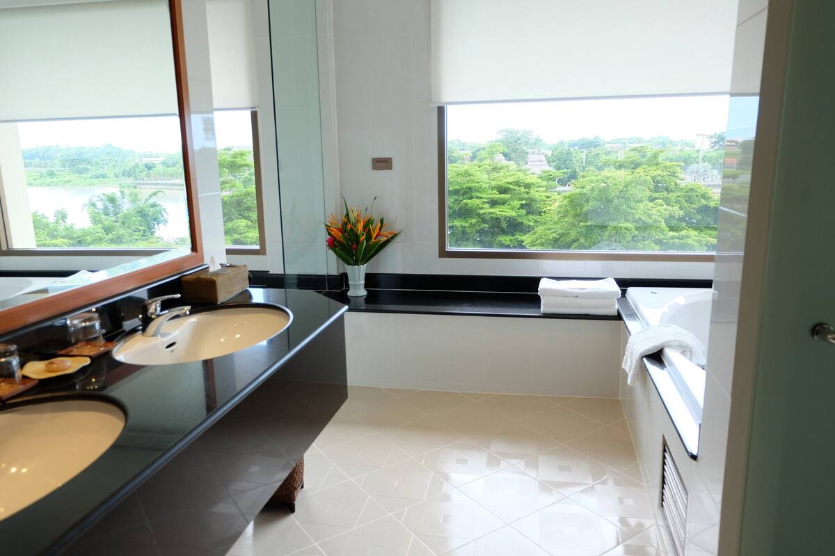 suite, balcony, river view | bathroom sink