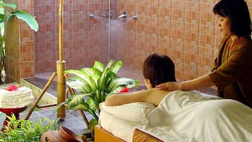 Experience a soothing massage in a serene spa setting, complete with a skilled therapist and a tranquil atmosphere.