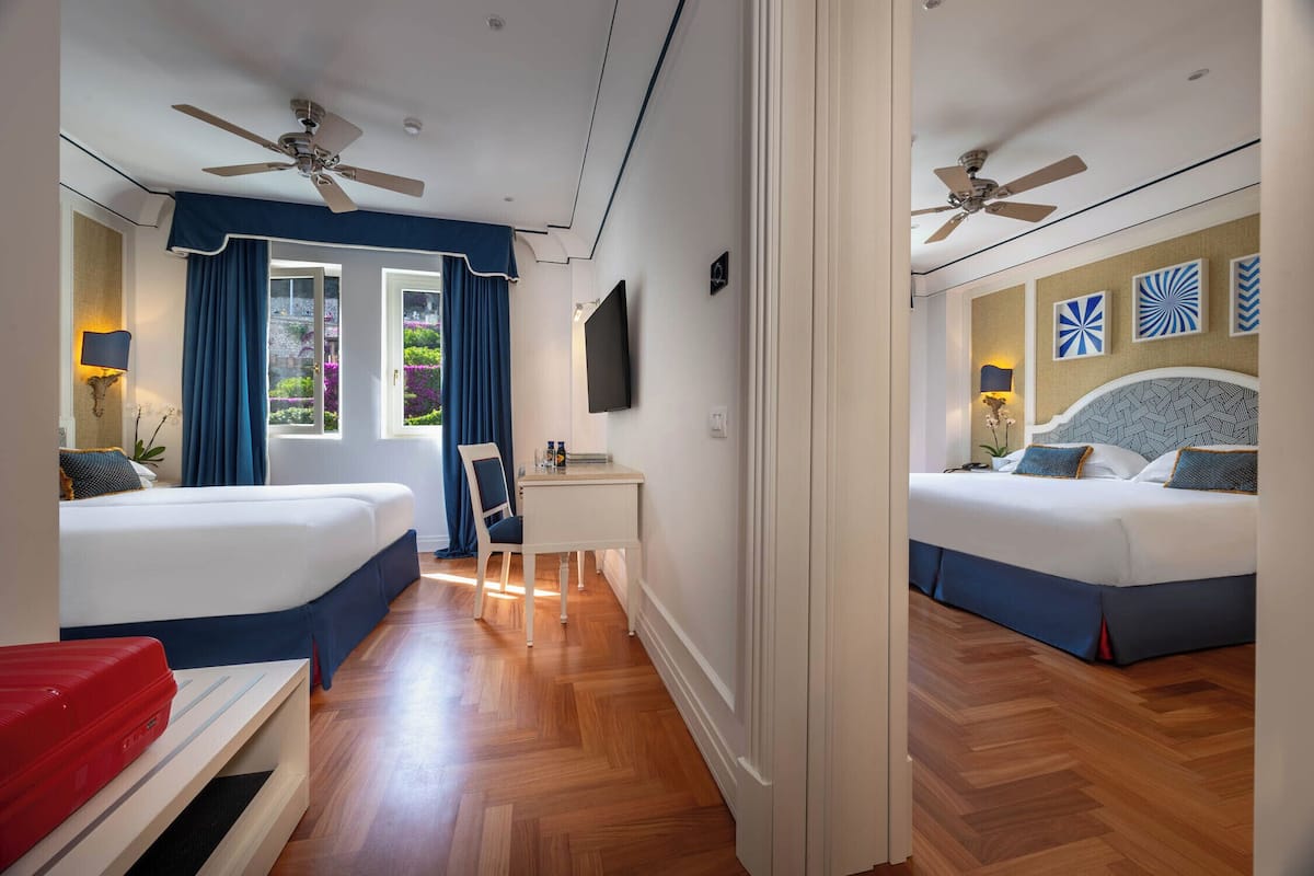 Superior kamer, kamers met tussendeur (Family) | 1 slaapkamer, een minibar, een kluis op de kamer, een bureau