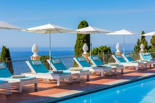 Seasonal outdoor pool, pool umbrellas, sun loungers