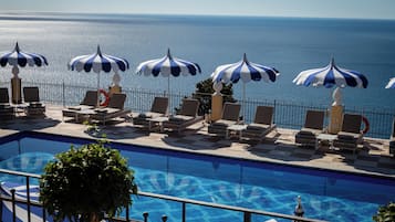 Seasonal outdoor pool, pool umbrellas, sun loungers