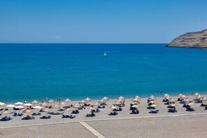 On the beach, beach umbrellas - SENTIDO Lindos Bay (Rhodes)