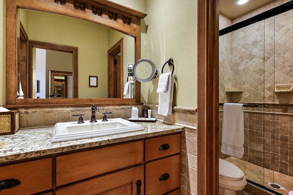 deluxe room, mountain view (309) | bathroom | free toiletries, hair dryer, towels, soap