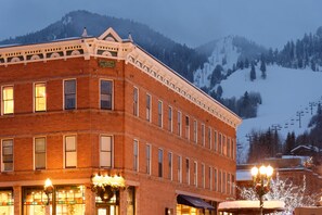 A brick building with multiple windows and a sign that reads "The Lodge." - Independence Square Lodge by Frias (Aspen)