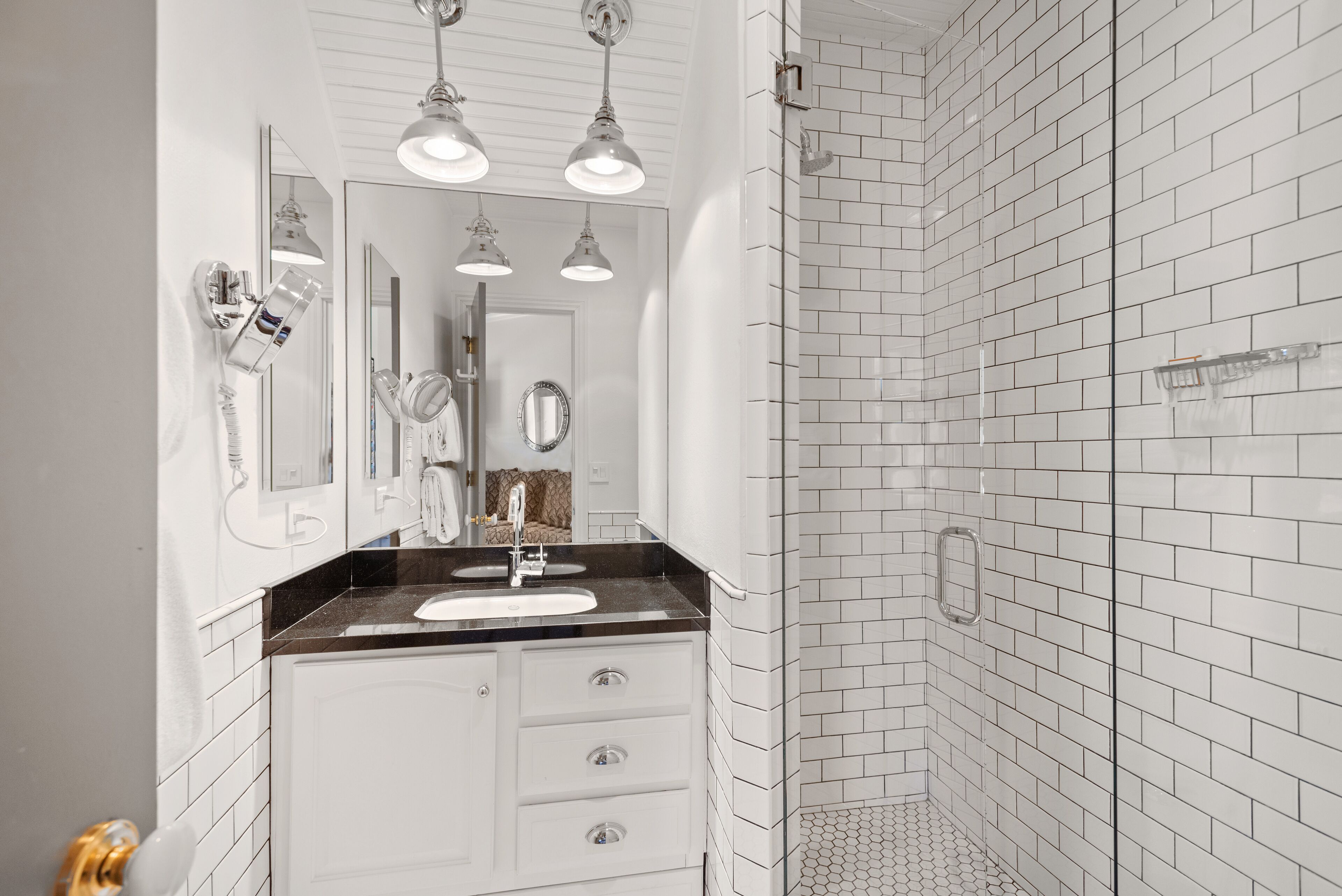 deluxe room (305) | bathroom | free toiletries, hair dryer, towels, soap