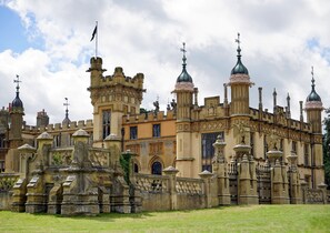 A historic building with ornate architecture, including turrets and statues. - Holiday Inn Express Stevenage by IHG (Stevenage)