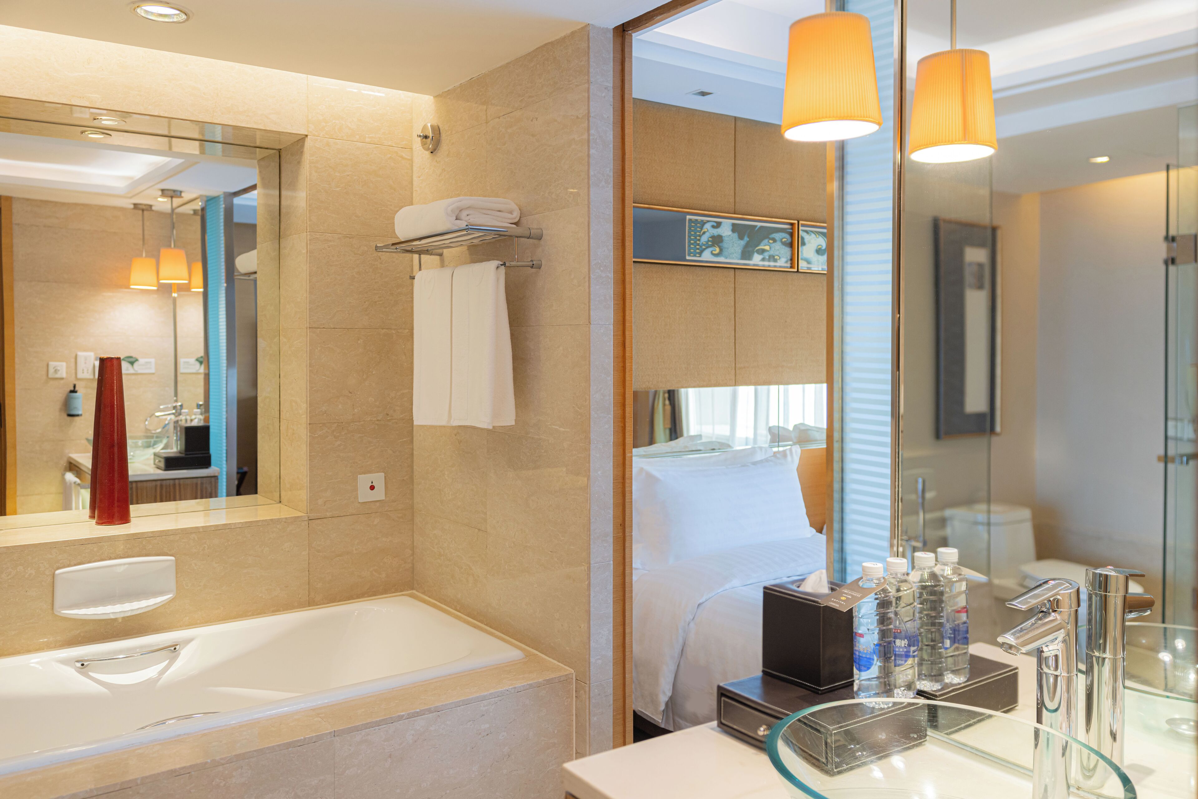 luxury room, 1 king bed, city view | bathroom | separate bathtub and shower, deep-soaking bathtub, designer toiletries