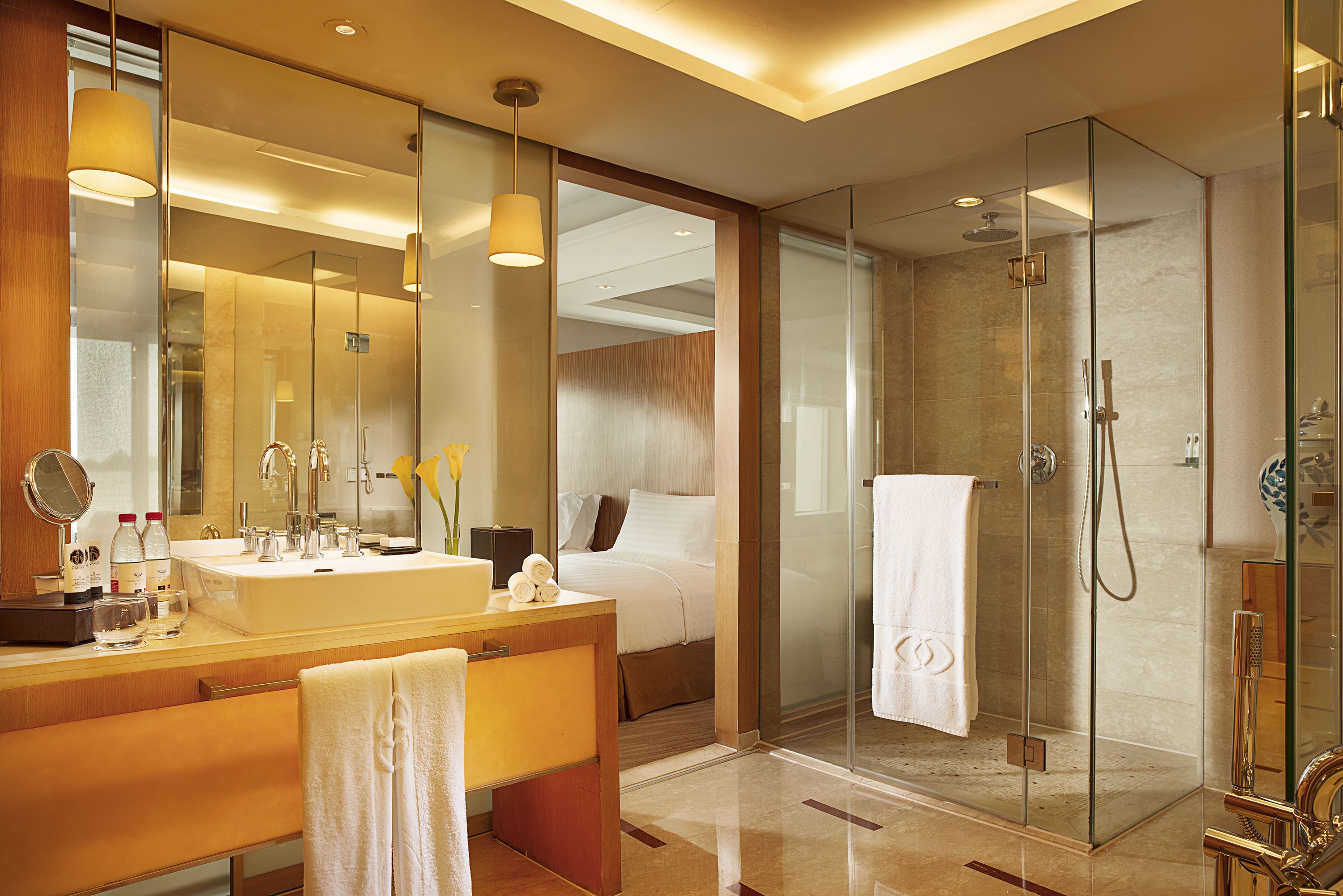 separate bathtub and shower, deep-soaking bathtub, designer toiletries
