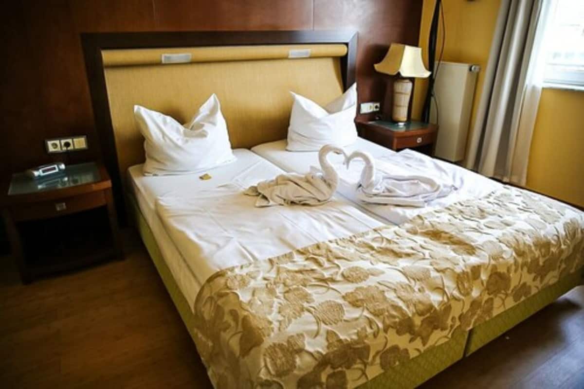 Suite | Luxe beddengoed, een minibar, een kluis op de kamer, een bureau