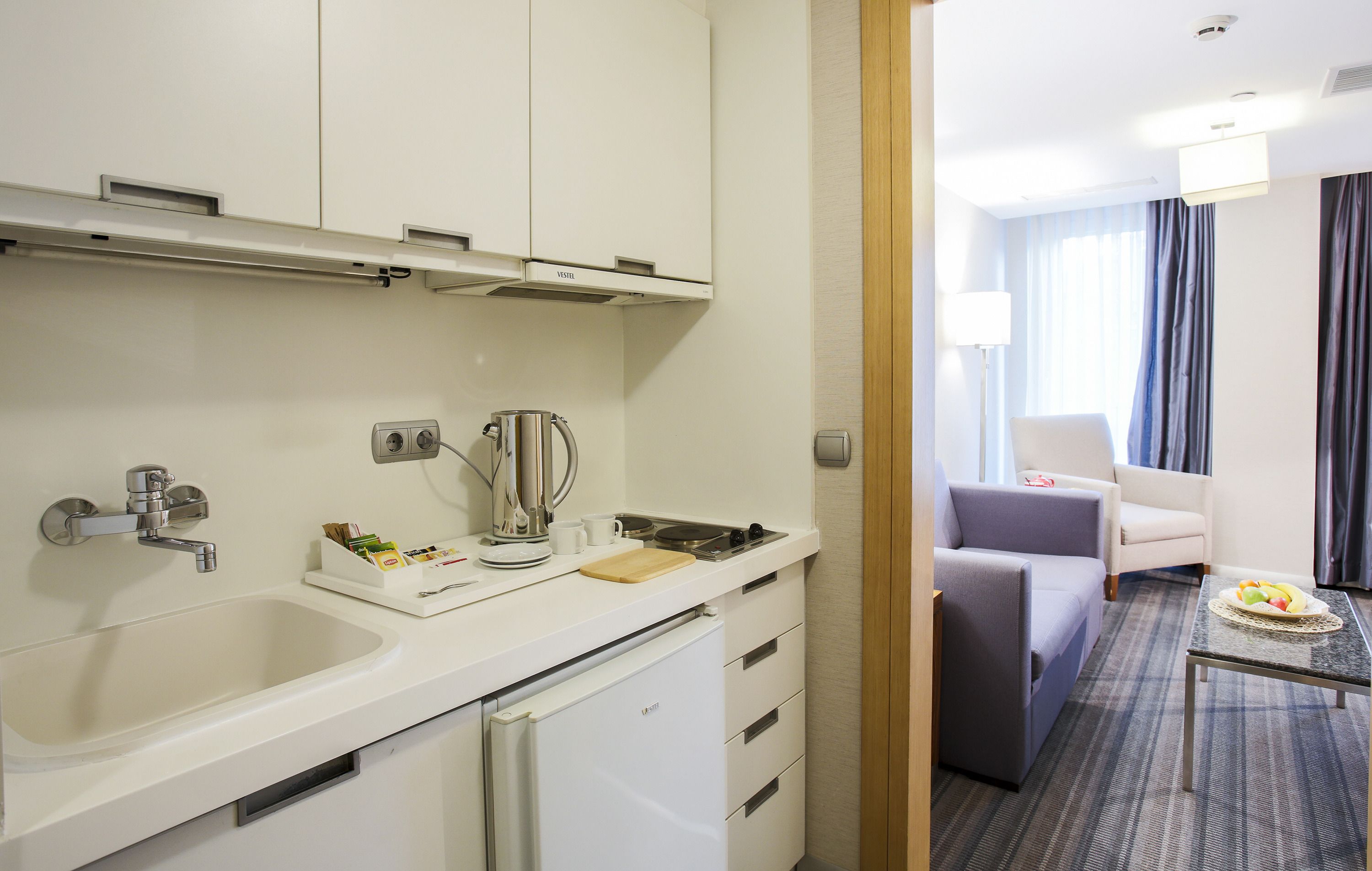 deluxe suite | private kitchenette | stovetop, electric kettle, cookware/dishes/utensils