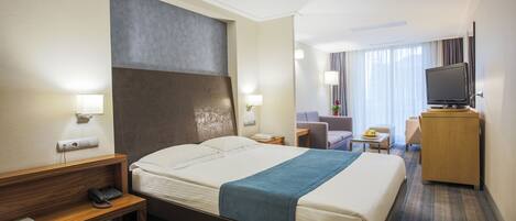 Suíte empresarial | Frigobar, cofres nos quartos, escrivaninha, cortinas blackout