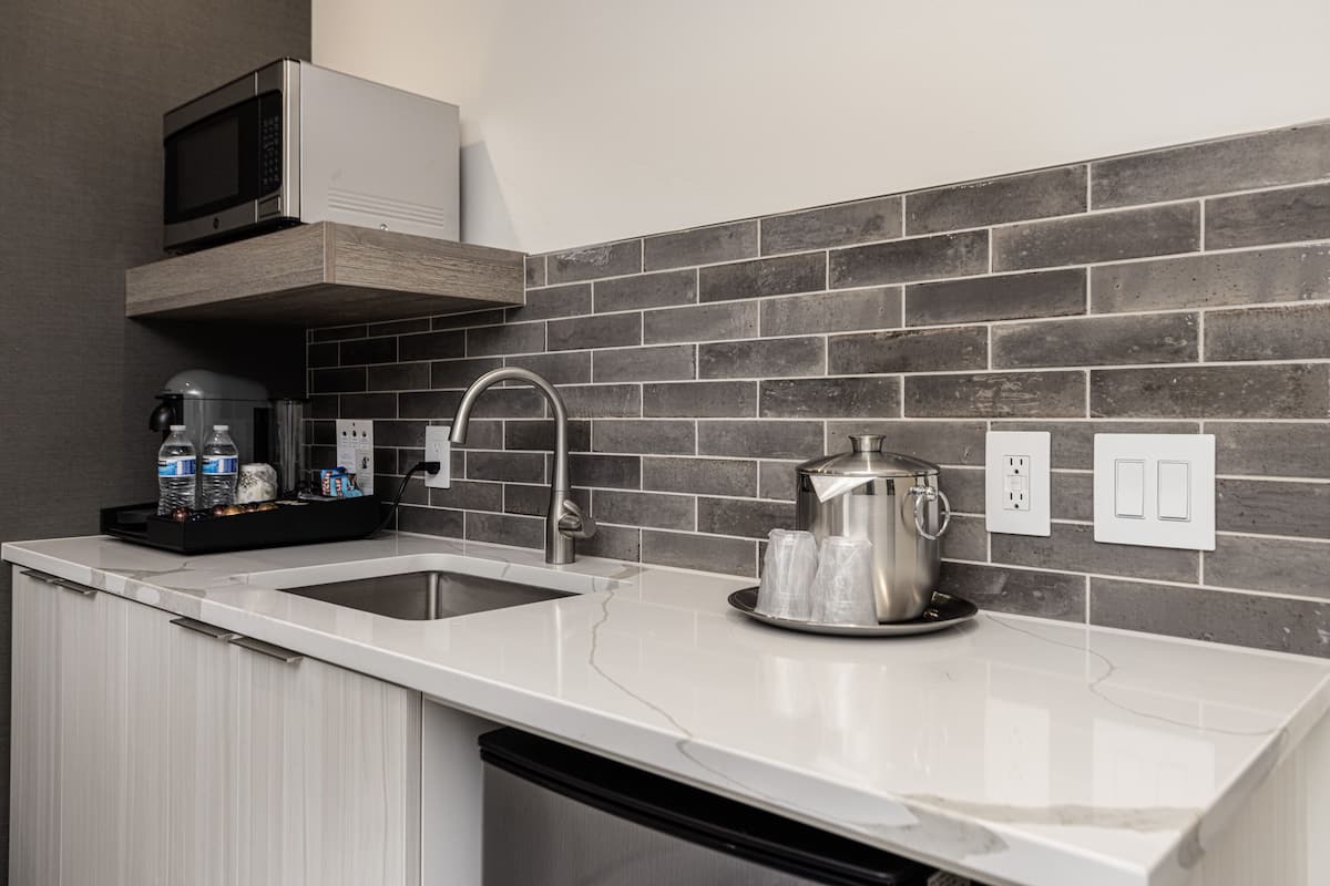 signature king suite | premium bedding, pillow-top beds, blackout curtains, free wifi