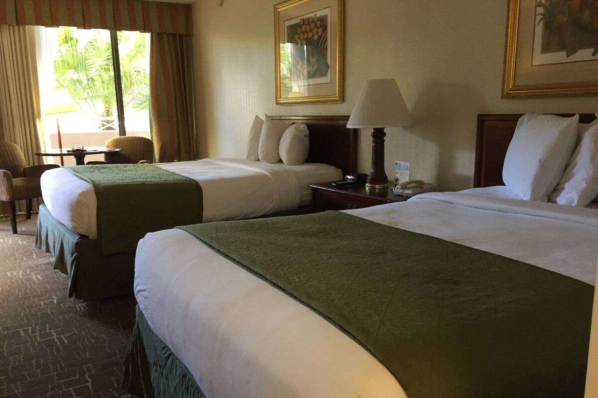 Room, 2 Double Beds | In-room safe, blackout curtains, iron/ironing board, free WiFi