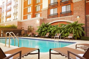 Outdoor pool, open 9:00 AM to 10:00 PM, pool umbrellas
