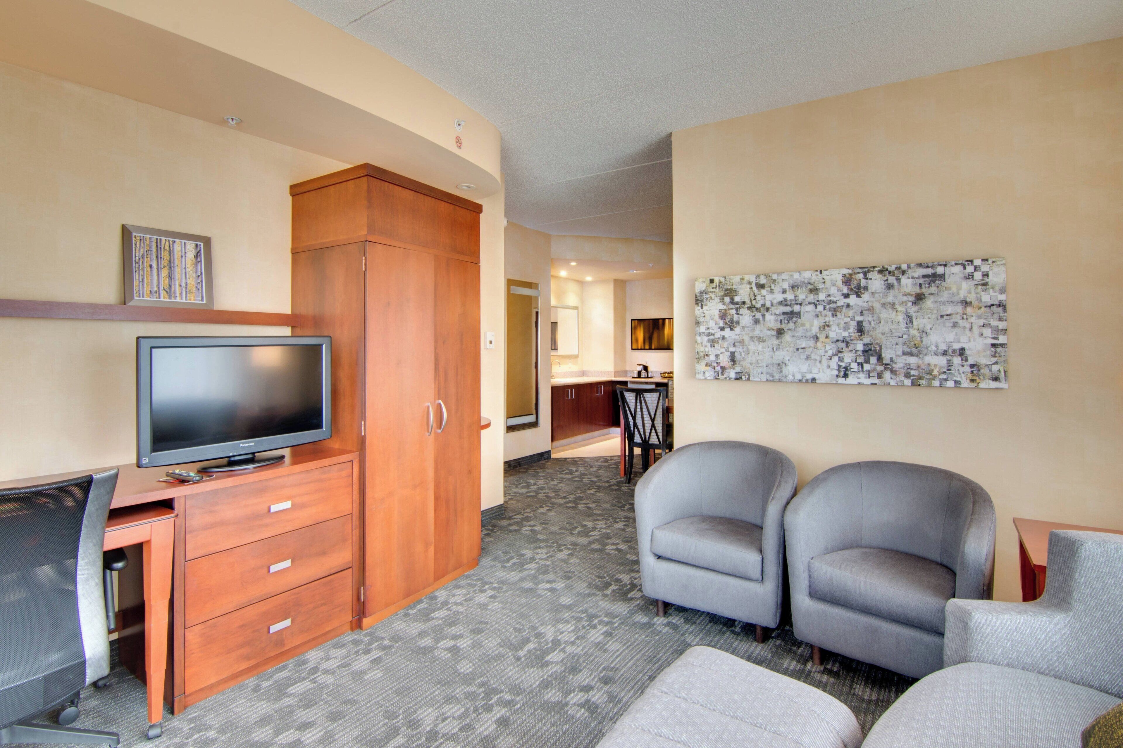 suite, 1 bedroom, non smoking | desk, laptop workspace, blackout curtains, iron/ironing board