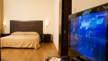 Una cassaforte in camera, culle/letti per bambini (a pagamento)