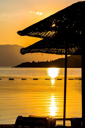 On the beach, free beach cabanas, sun-loungers, beach umbrellas