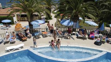 Seasonal outdoor pool, pool umbrellas, sun loungers