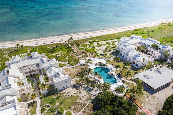 Plage, sable blanc, snorkeling, planche à voile