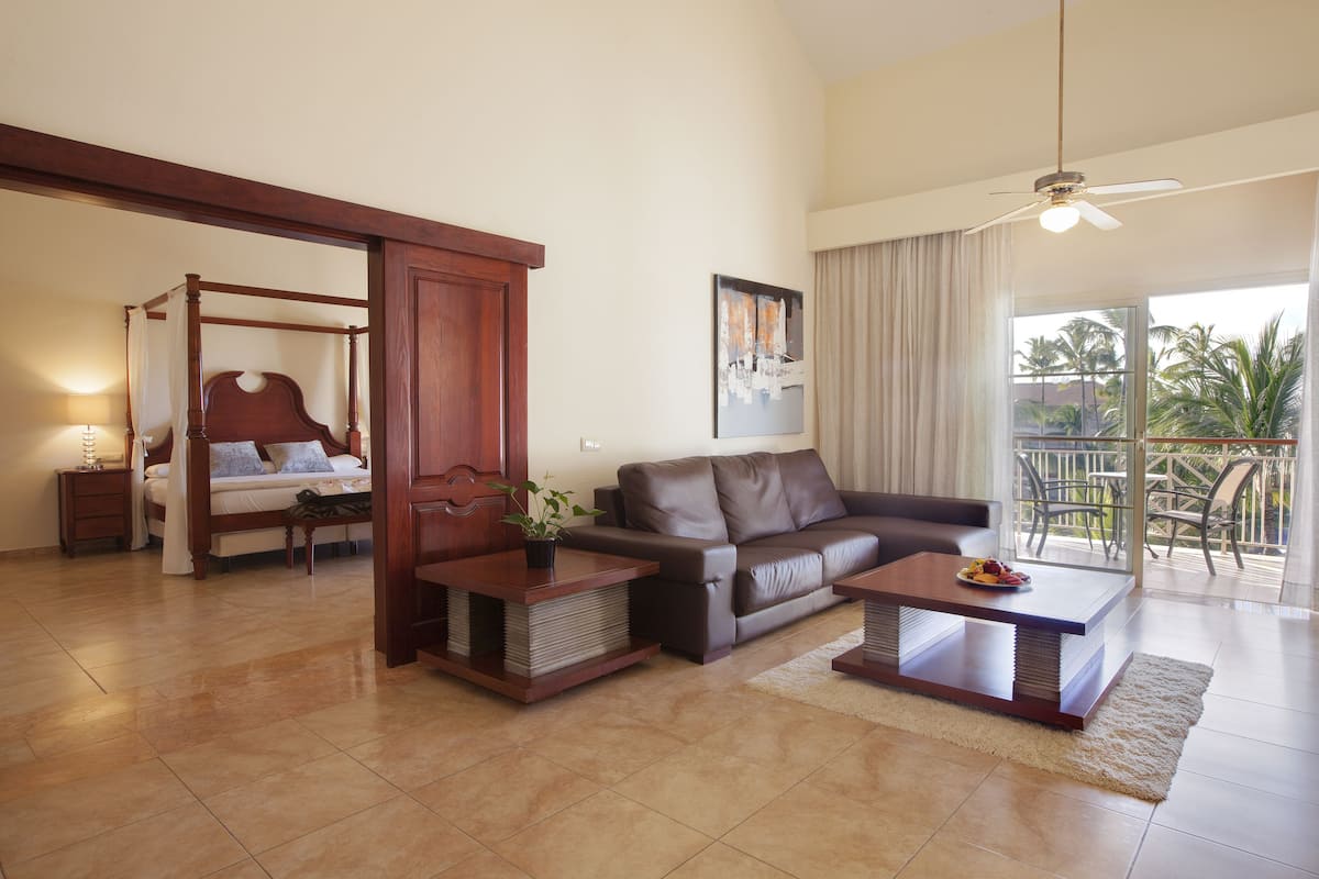 Colonial Club One Bedroom Suite with Indoor Hot Tub (Adults Only) | Living room | 32-inch plasma TV with satellite channels, TV