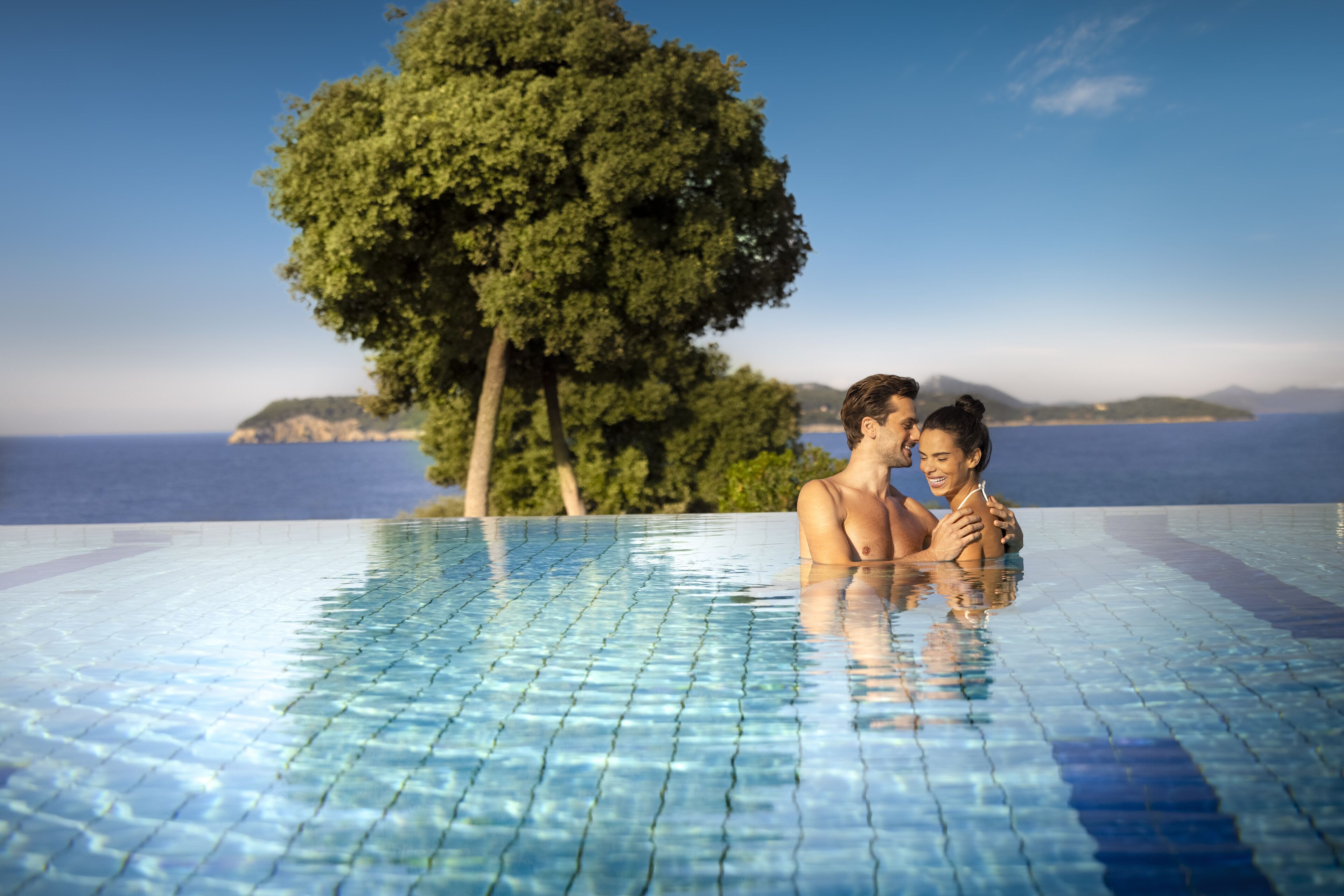 indoor pool, seasonal outdoor pool, pool umbrellas, pool loungers