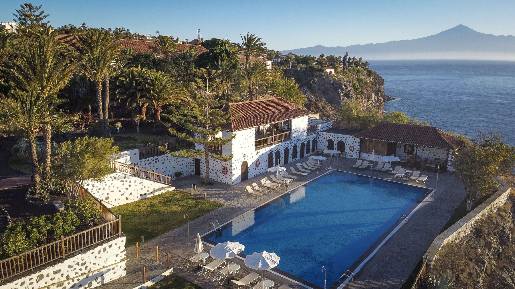 Outdoor pool, pool umbrellas, pool loungers