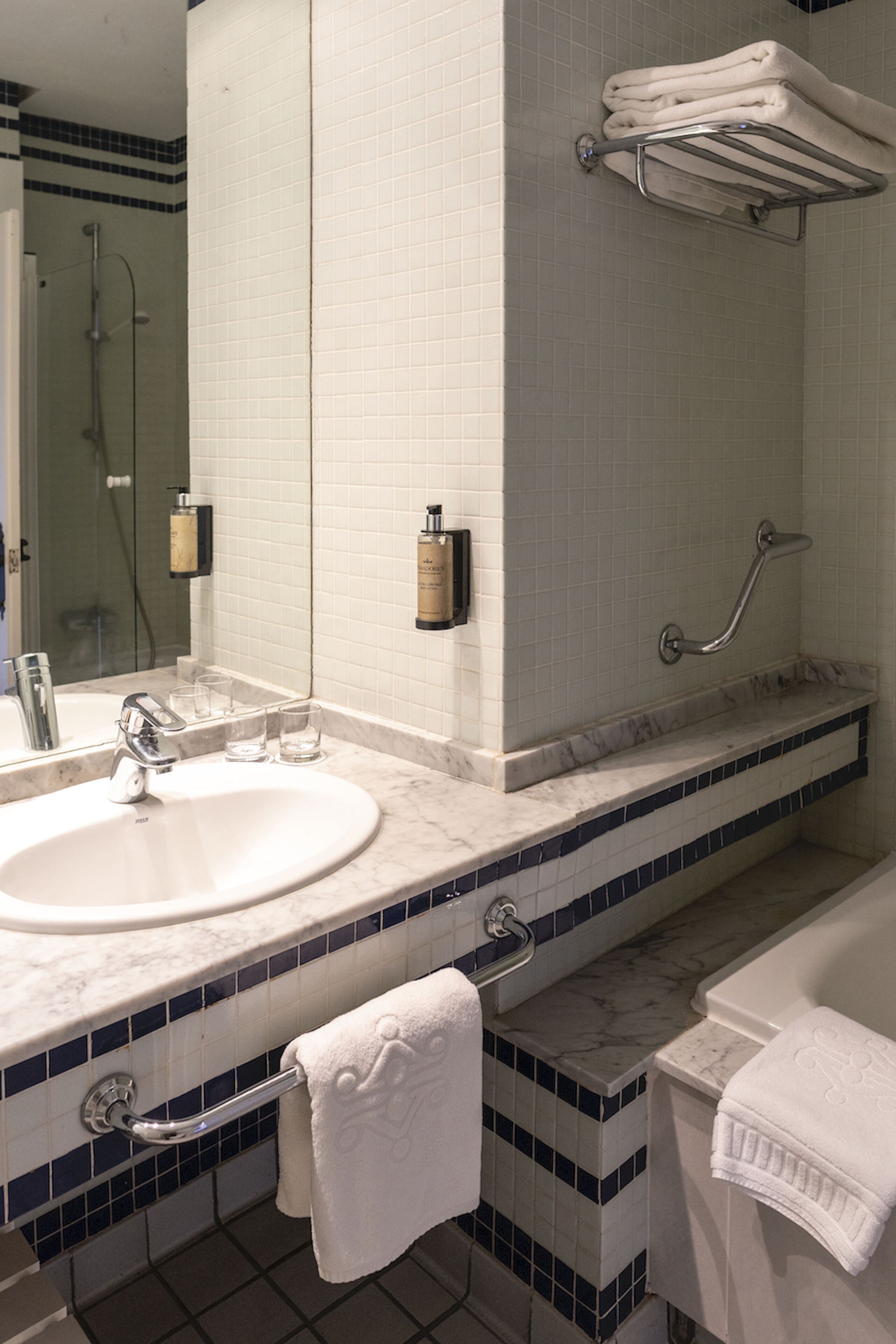 bathtub, free toiletries, hair dryer, towels