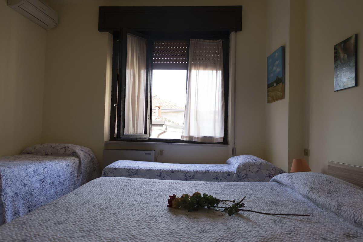 Quadruple Room | Frette Italian sheets, Select Comfort beds, in-room safe, desk